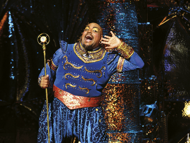 Genie from Aladdin in a blue costume