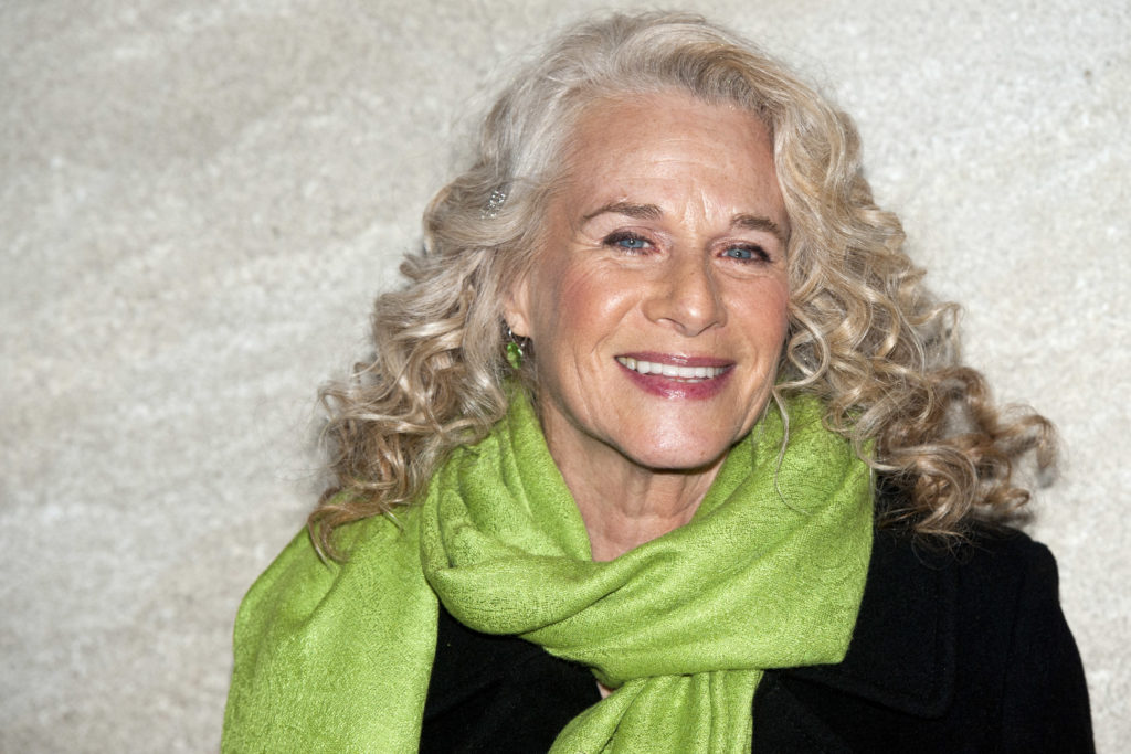 FILE - In this Nov. 30, 2011 file photo, musician Carole King attends the Rockefeller Center Christmas tree lighting in New York. Producers announced Friday, March 15, 2013 that they plan to take “Beautiful: The Carole King Musical” to Broadway by spring 2014. (AP Photo/Charles Sykes, File) ORG XMIT: NY116