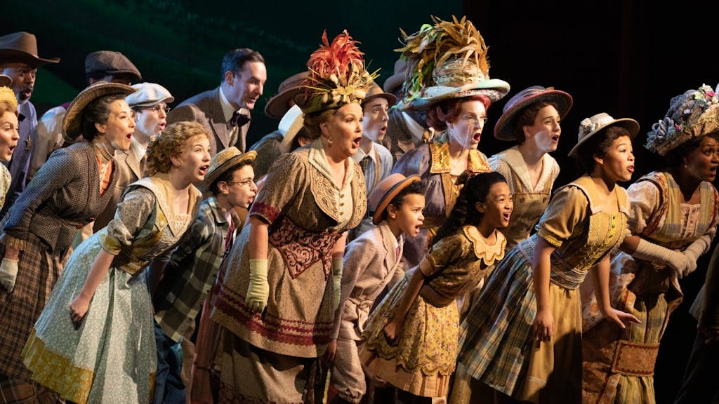 The ensemble of The Music Man